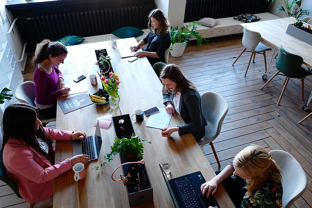 Managing schedule conflict in talent management for high performing teams